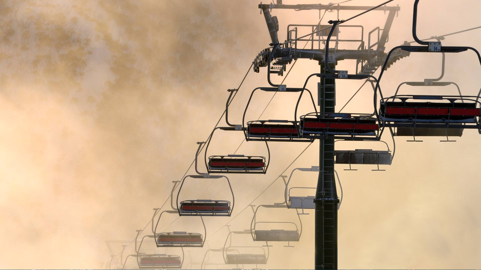 Close-up of chairlift during sunrise in Mt Hotham, Victoria (© VMJones/iStock/Getty Images Plus)(Bing Australia)
