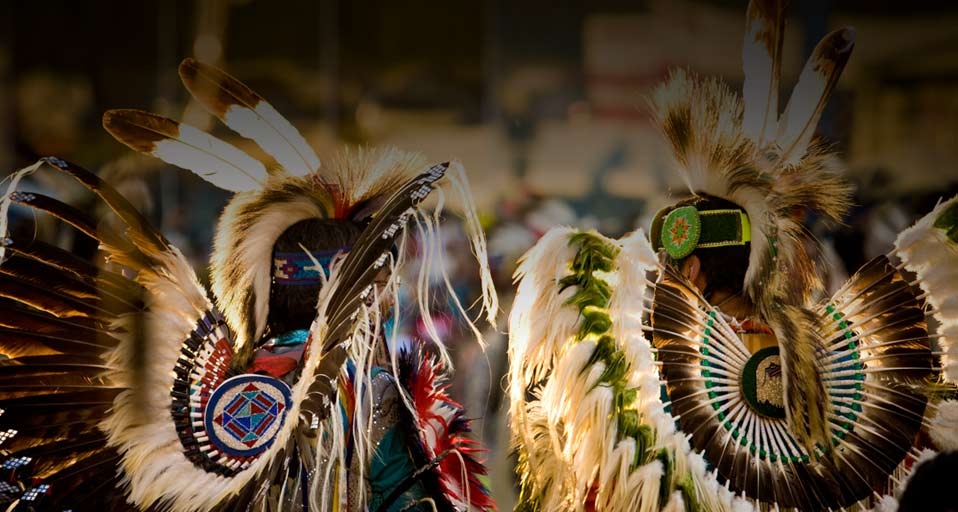Two Native Americans wear elaborate costumes at a powwow in Post Falls, Idaho -- Kirk Mastin/Aurora Photos &copy; (Bing United States)