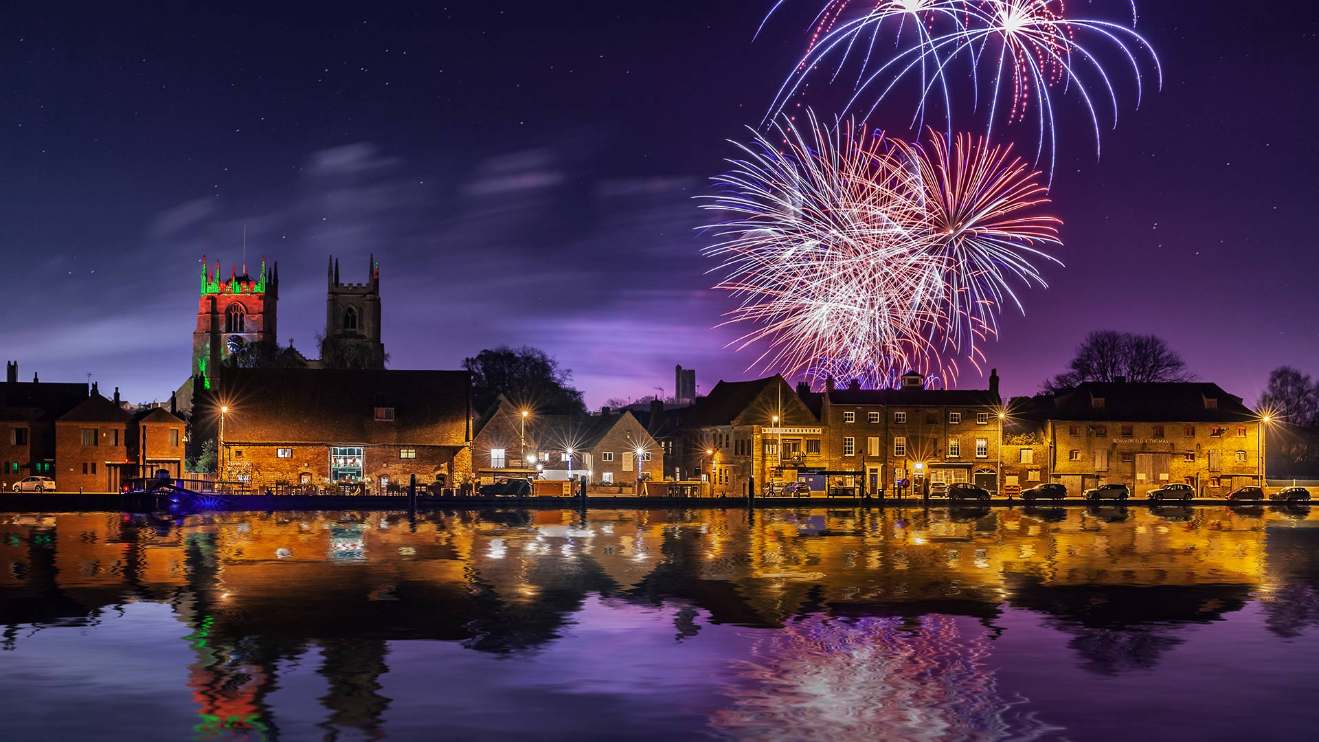 Fireworks exploding over the Great River Ouse, King