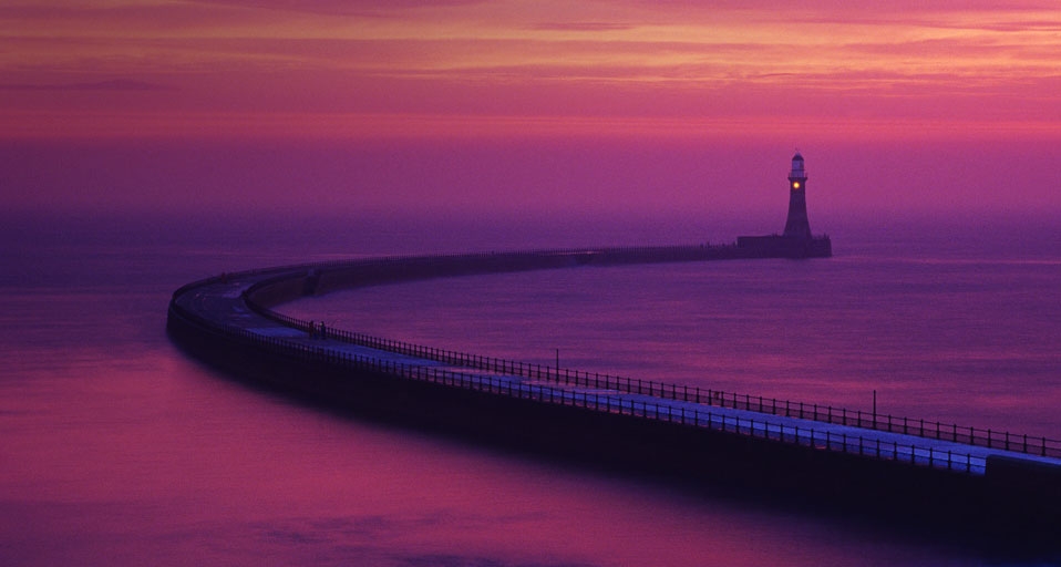 Winter sunrise over the beach at Roker Pier in Sunderland --Roger Coulam/Photolibrary &copy; (Bing Australia)