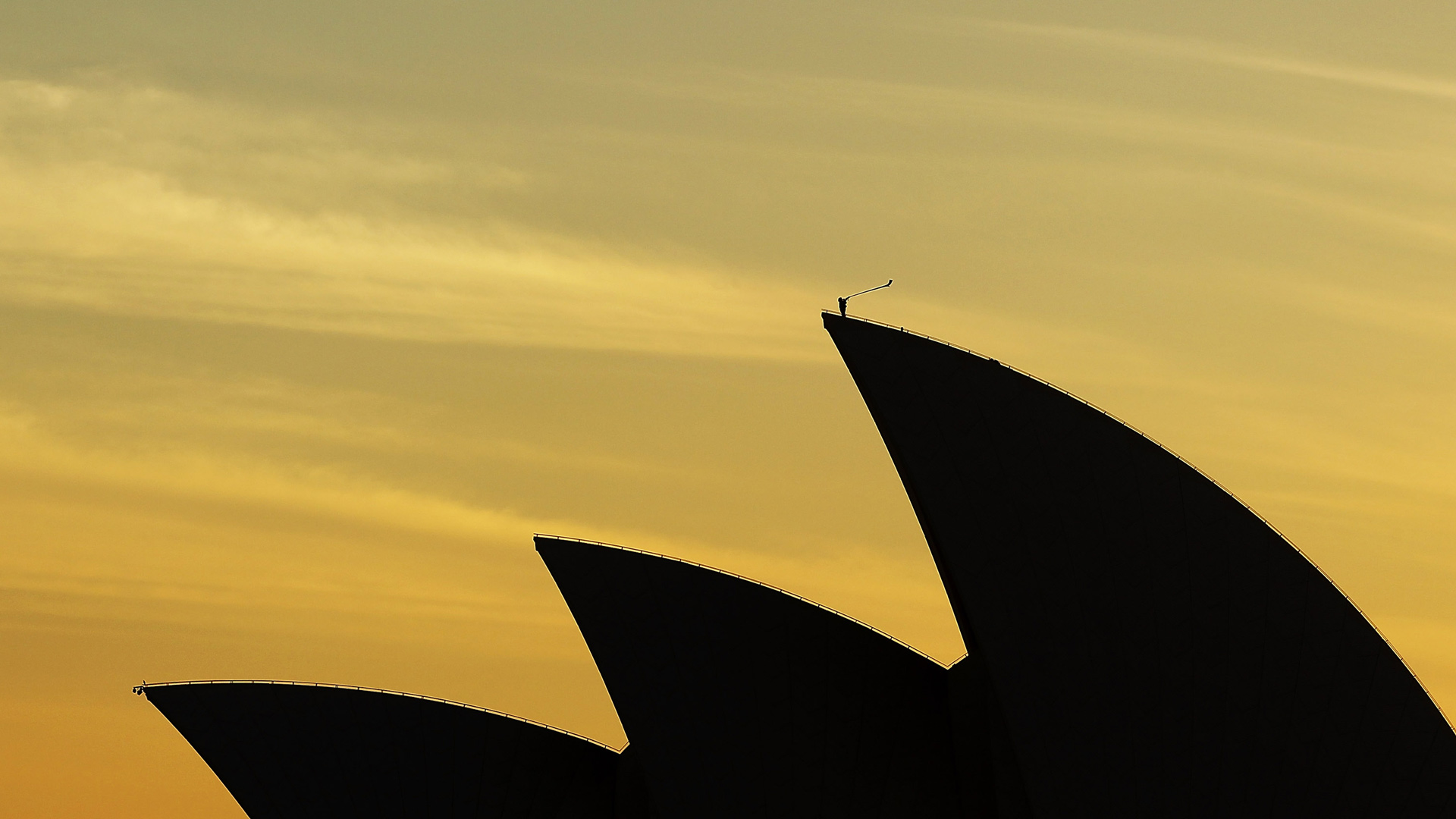 Arkady Shilkloper plays his three-metre-long alphorn atop the Sydney Opera House as part of the 2013 Sydney Festival (© Mark Metcalfe/Getty Images)(Bing Australia)