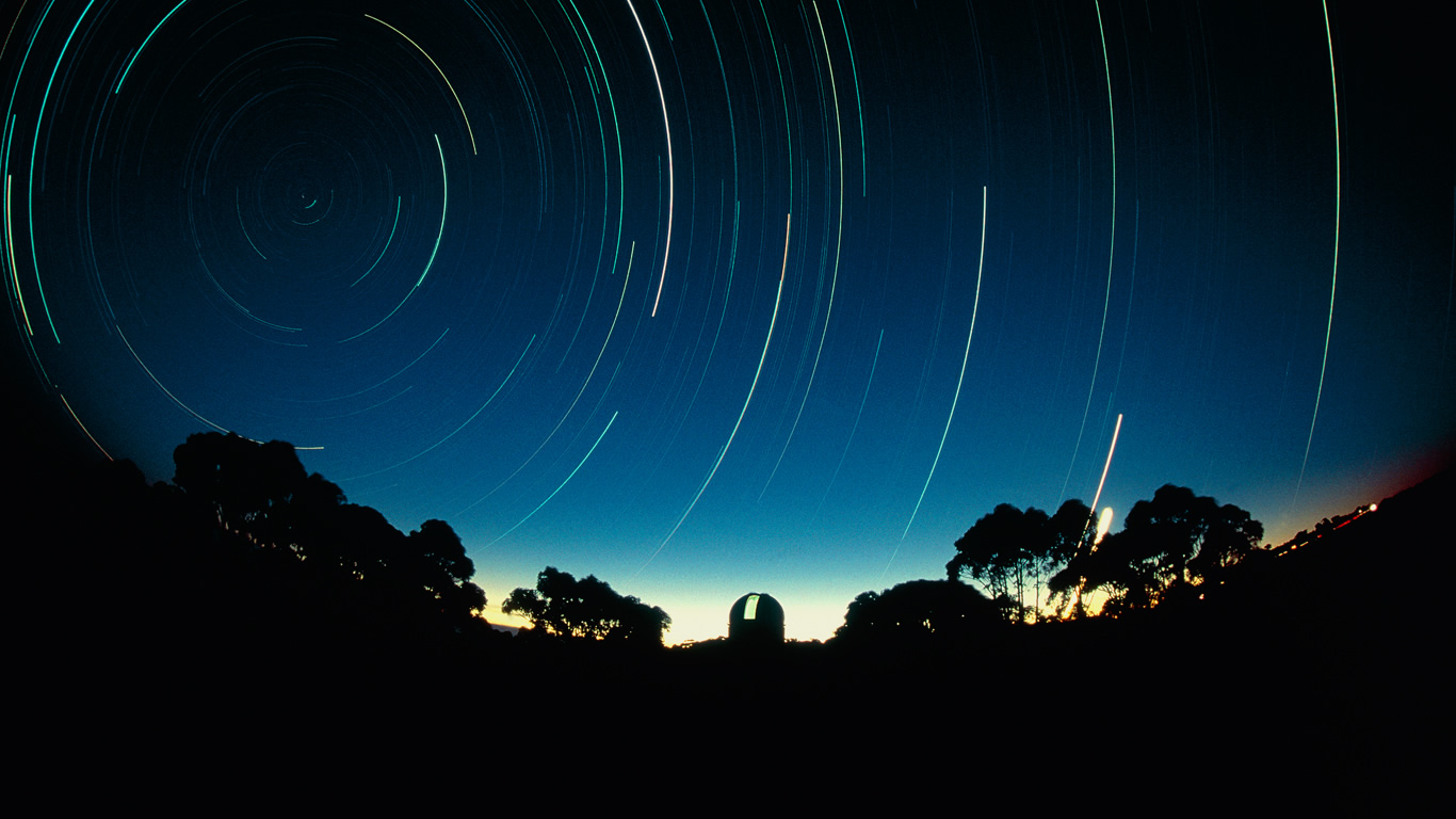 Time-lapse image of the skies above the Siding Spring Observatory near Coonabarabran in New South Wales, Australia (© David Nunuk/Science Photo Library)(Bing Australia)