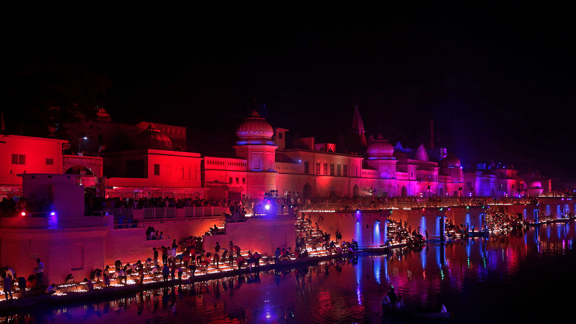 Devotees light oil lamps on the banks of the Sarayu River in Ayodhya, India (© Rajesh Kumar Singh/AP Photo)(Bing Canada)