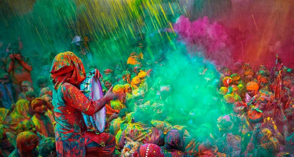 Gathering of people during Holi (Festival of Colors), India -- Poras Chaudhary/Getty Images &copy; (Bing United States)