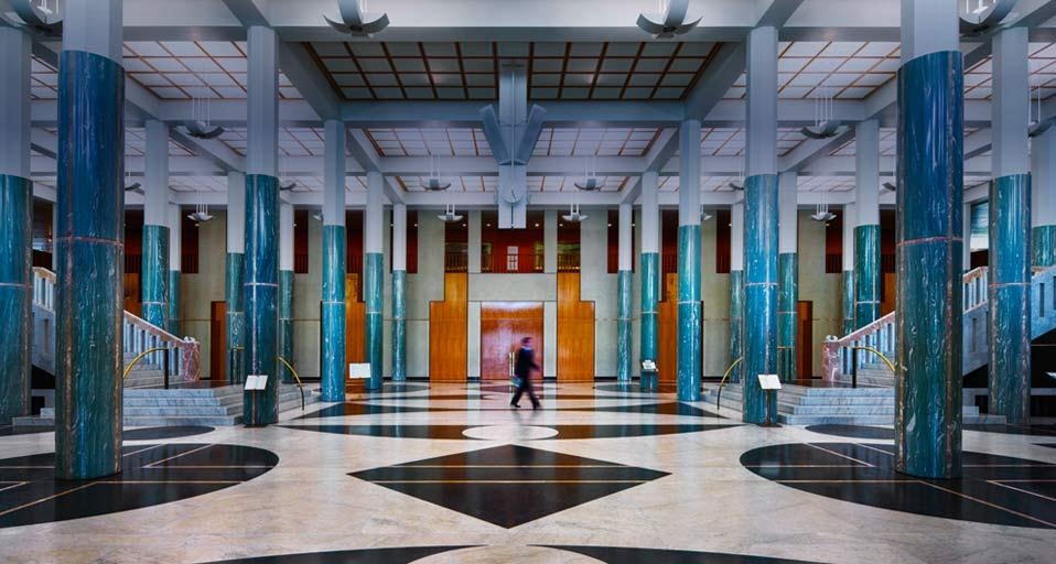 Man walking through the main foyer in the New Parliament House (© Jon Hicks/Corbis) &copy; (Bing Australia)
