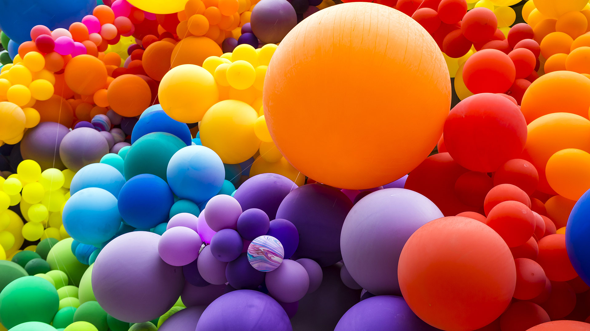 Rainbow balloons for Pride Day (© lazyllama/Shutterstock)(Bing Canada)