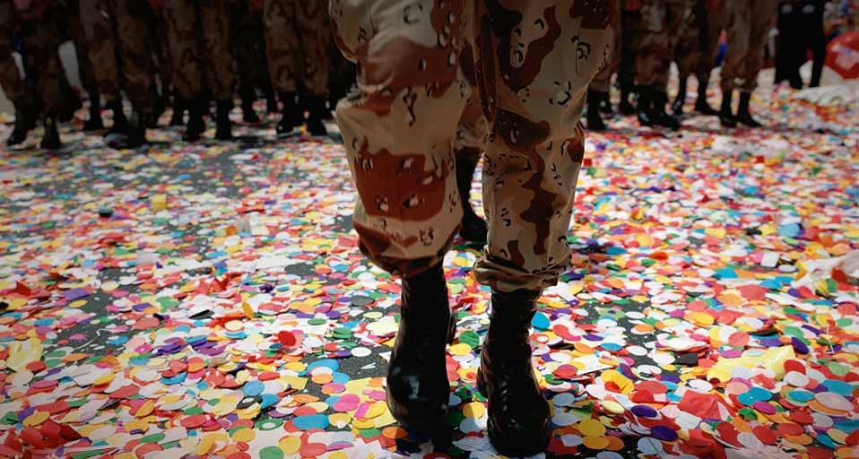 Solider walking in confetti after a parade (© Visions of America/Joe Sohm/Digital Vision/Getty Images) &copy; (Bing United States)