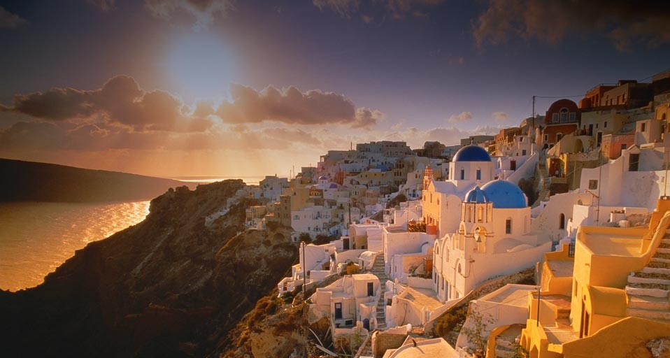 The village of Oia on the island of Santorini, Greece at sunset -- Miles Ertman/Masterfile &copy; (Bing Canada)