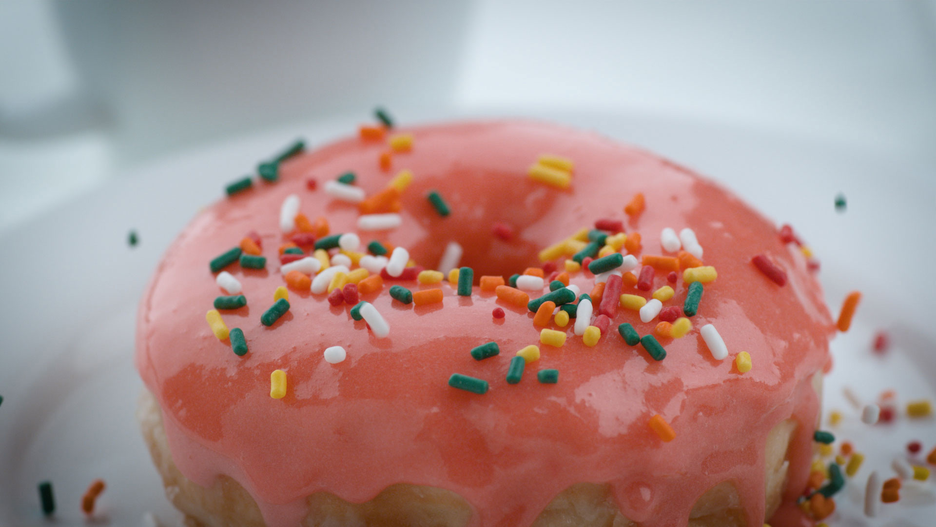 A glazed doughnut with sprinkles (© viafilms/Getty Images)(Bing United States)