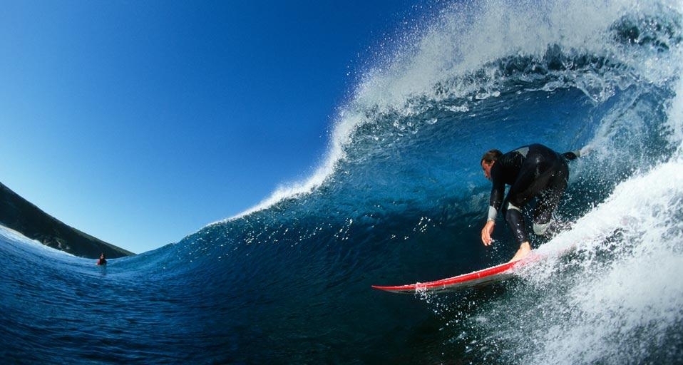 Side View of a Surfer Riding a Wave, Injidup Beach, Western Australia (© Chris van Lennep/Getty Images) &copy; (Bing Australia)