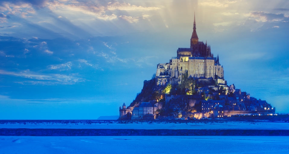 Mont-Saint-Michel at dusk, Normandy, France -- Harald Sund/Getty Images &copy; (Bing Canada)